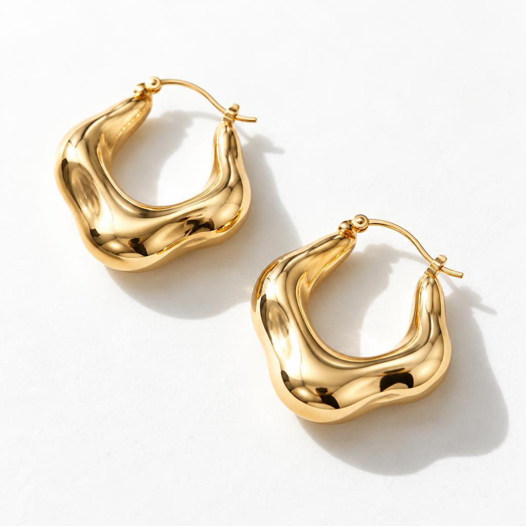 Organic sculptural gold hoop earrings